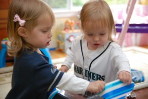 Lydia and Hadley taking it upon themselves to unwrap father's day presents