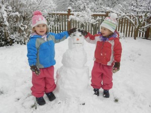 Lydia and Hadley's first snow man!
