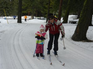 Hadley and Gigi cross-country skiing (the girls switched coats on day 2)
